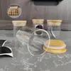 Neatly arranged stackable glass canisters keeping dry goods like cereal, pasta, and beans fresh with airtight seal.