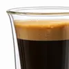 Clear double wall coffee glass featuring gently curved outer sides and a rounded inner beverage chamber