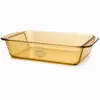 Large 4.1L amber rectangular borosilicate glass baking dish with integrated side handles for oven cooking and food serving.