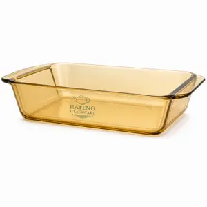 Large 4.1L amber rectangular borosilicate glass baking dish with integrated side handles for oven cooking and food serving.