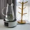 Clear glass water serving jug with ergonomic handle and drip-free pouring spout