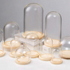 Elegant glass display dome with wooden base by Jiateng, ideal for showcasing small items, candles, or decorative pieces