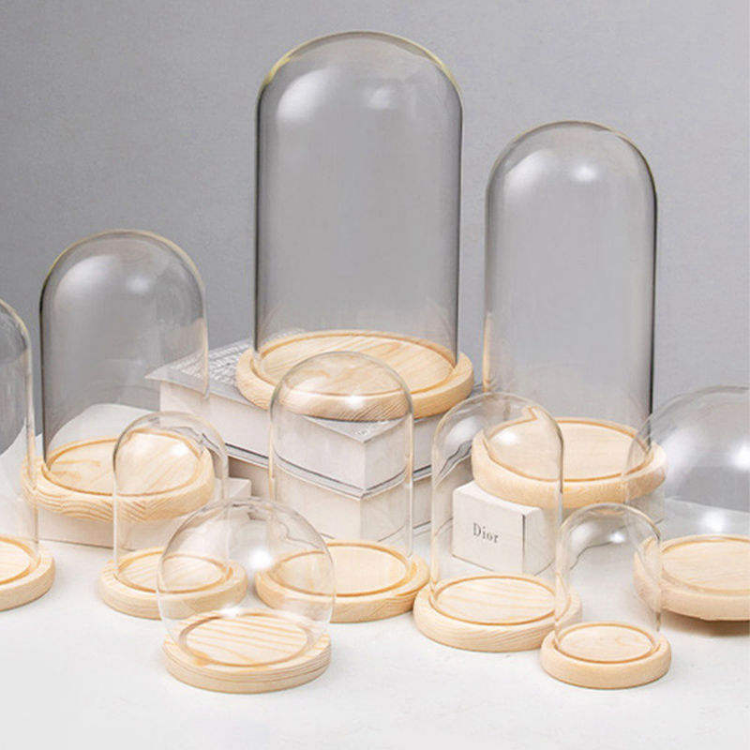 Elegant glass display dome with wooden base by Jiateng, ideal for showcasing small items, candles, or decorative pieces