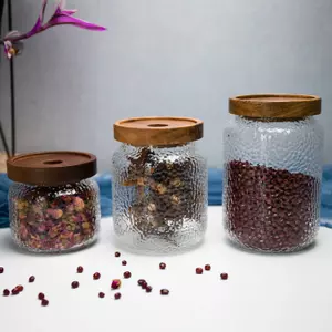 Jiateng textured glass storage jars with wooden lids for tea spices grains and kitchen organization