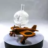 Elegant nautical-inspired whiskey decanter with sailing ship inside glass bottle