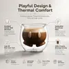 Side view of an 88mm tall rounded double wall coffee glass with 80mm opening and decorative inner chamber