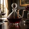 Decorative glass red wine decanter with broad base and tapered shoulder design