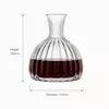 Wide base wine decanter with vertical ribbed glass design for red wine serving