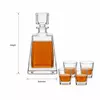 Geometric glass whiskey decanter with four short whiskey tumblers