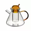 Handmade borosilicate glass teapot with amber handle and built-in glass infuser for loose leaf tea