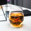 Close-up of 3D starfish design at the base of glass cup