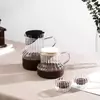 Elegant ribbed glass coffee carafe with lid for pour over brewing and serving