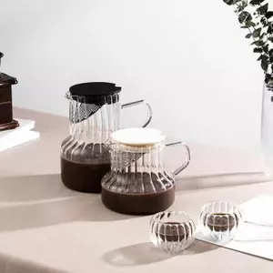 Elegant ribbed glass coffee carafe with lid for pour over brewing and serving