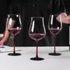 Jiateng modern red stem wine glasses set with black base, showcasing elegant and contemporary crystal stemware for dinner party