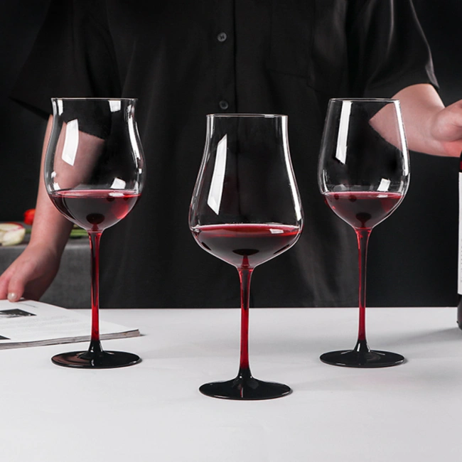 Jiateng modern red stem wine glasses set with black base, showcasing elegant and contemporary crystal stemware for dinner party