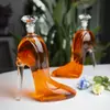 Elegant shoe shaped glass bottle for whiskey wine and cocktail display