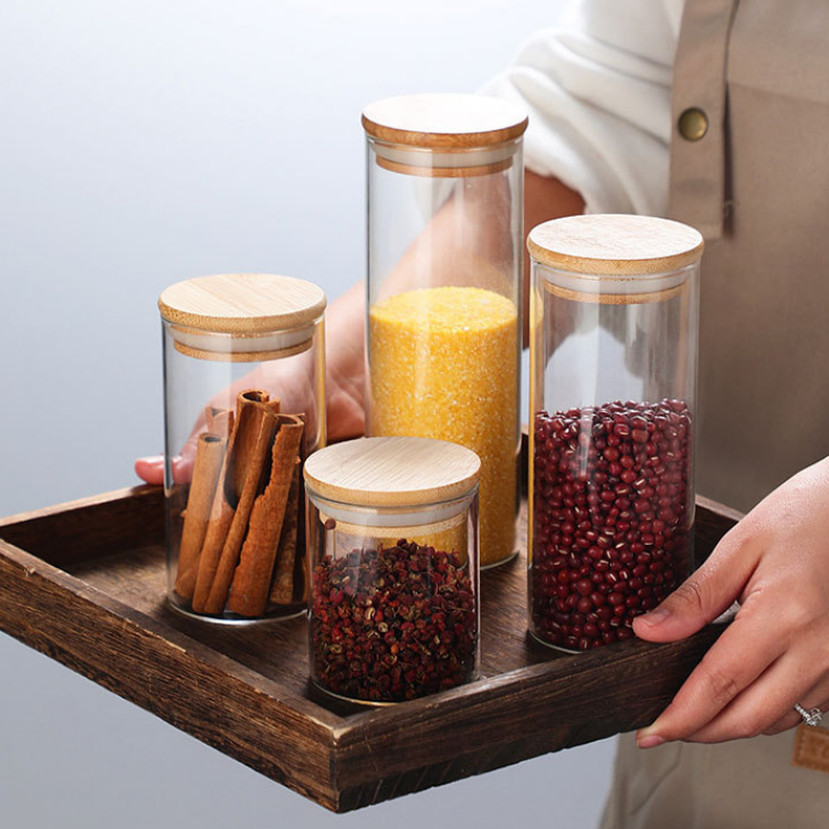 High-quality Jiateng glass jars with bamboo lids, ideal for kitchen storage, organizing dry food, and displaying pantry items