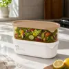 Stackable oval food storage containers with transparent amber sections beige lids white PP bases and removable trays for kitchenware wholesale