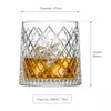 Clear geometric whiskey tumbler with diamond pattern for spirits serving