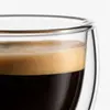 Clear espresso glass featuring a rounded inner chamber and visible double wall construction