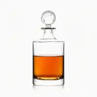 Globe glass stopper whiskey decanter with clear body for premium spirits serving