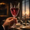 Clear stemmed wine glass with decorative diamond pattern on lower bowl