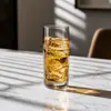 compact straight sided glass for spirits and cold beverage serving