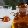 Elegant heat-resistant glass teapot with integrated glass filter for herbal tea and flowering tea