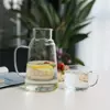 Stylish modern glass hydration set designed for convenient bedside beverage serving