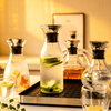 Jiateng glass pitcher with black lid, elegant and functional, great gift for housewarming, holidays, or birthdays