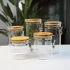 Premium Jiateng glass pantry jars with bamboo lids and metal clip locks for elegant food storage