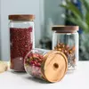Stylish Jiateng reusable glass storage jars with natural wooden tops for modern kitchen decor
