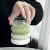Close-up of the unique 4-tier stacked bubble texture on a clear borosilicate glass cup