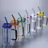 Vibrant colored glass mug featuring a sturdy handle, leakproof lid, and reusable straw. Perfect for iced coffee, juice, or water on the go.