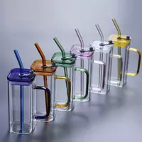 Vibrant colored glass mug featuring a sturdy handle, leakproof lid, and reusable straw. Perfect for iced coffee, juice, or water on the go.
