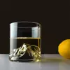 Close-up detail of the 3D Fuji mountain range sculpted inside the clear glass base