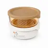 Round stackable food storage containers available in 300ml 450ml and 650ml sizes with beige lids transparent bodies and white bases