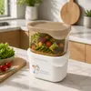 Stackable food storage container design featuring a removable inner tray and fitted lid with a practical rectangular shape for organized food storage.