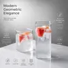 Tall clear square drinking glass with smooth exterior and rounded rectangular rim