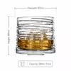 Clear spiral whiskey glass with distinctive textured walls and modern tumbler shape
