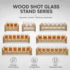 Small spirits tasting glasses arranged in two rows for bar and beverage service