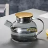 Lead-free borosilicate glass pitcher with stainless steel lid for premium beverage presentation