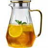 Modern glass pitcher with matching drinking cup for stylish home dining and entertaining