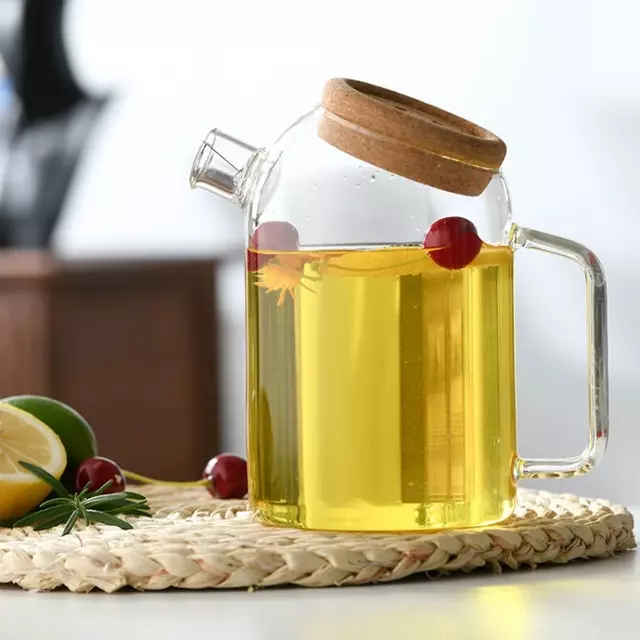 Premium tilted lid glass cold water pitcher with natural wooden cover for modern beverage serving