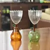 Clear glass cup with pear and apple-shaped base, ideal for serving wine, juice, or cocktails, perfect for home and parties