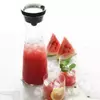 Modern reusable glass juice carafe with leakproof lid for kitchen and dining use