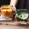 Clear glass coffee mug with minimalist bear face design