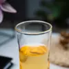 Elegant curved glass tumbler with crystal-clear finish for modern homes