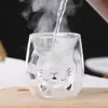 aesthetic double wall glass cup with cat illustration and milk beverage