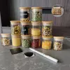 Aesthetic clear glass jars with wooden lids, enhancing modern kitchen decor while providing practical storage.